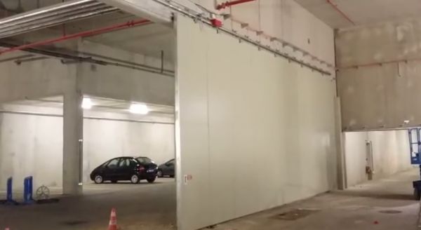 Pose de porte coulissante coupe-feu dans un parking souterrain de 11m à Marseille, 13