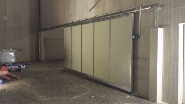 Pose de porte coulissante par flamme de parking à Marseille, 13